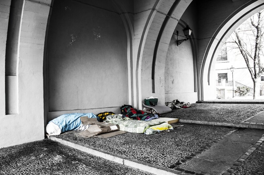 Picture of pillows and bedding outside of a building